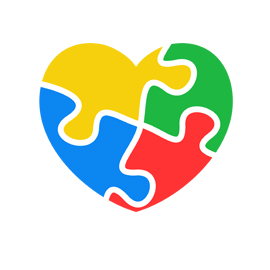 Grafika. Symboliczne serce podzielone na cztery części jak puzzle, każda w innym kolorze. Jego górna część jest żółta, prawa zielona, dolna w kolorze czerwony, a lewa niebieskim.